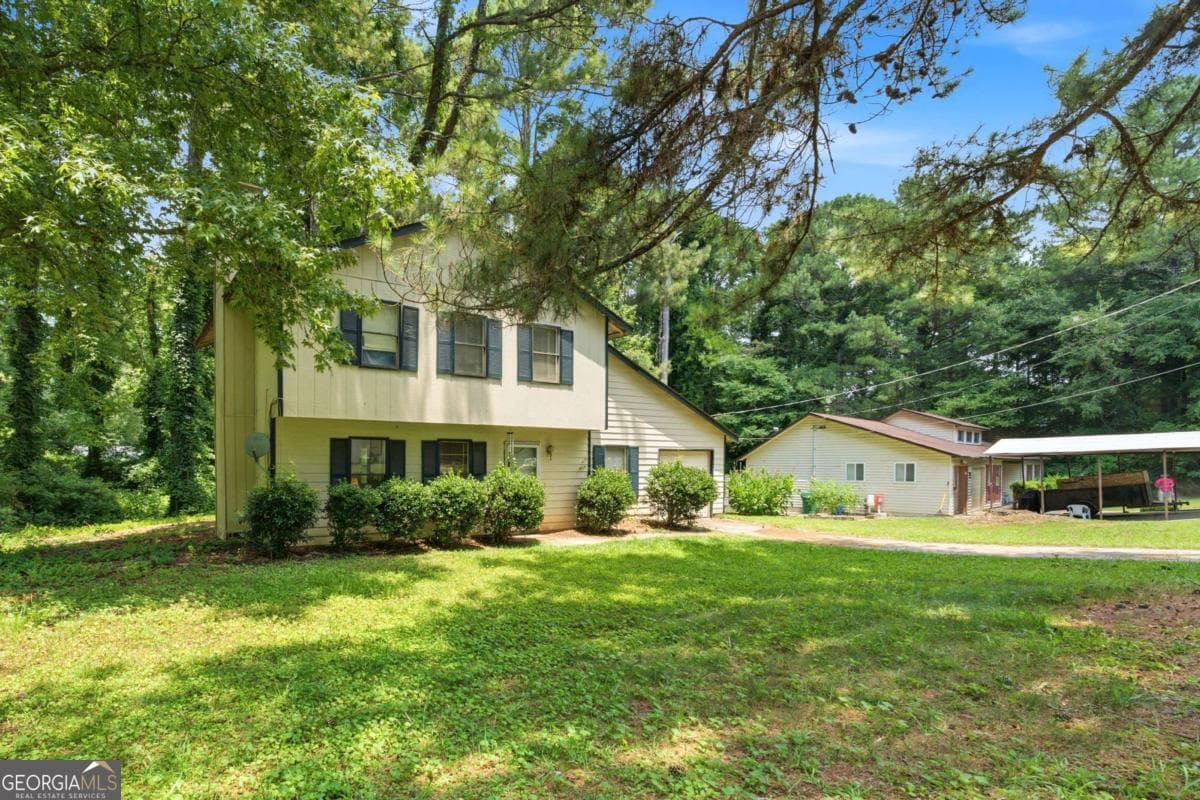 3 bedroom, 2 bathroom, 1,196 sq ft single family residence for sale at 3957 Brookstone Court, Ellenwood, GA 30294 — photo 2
