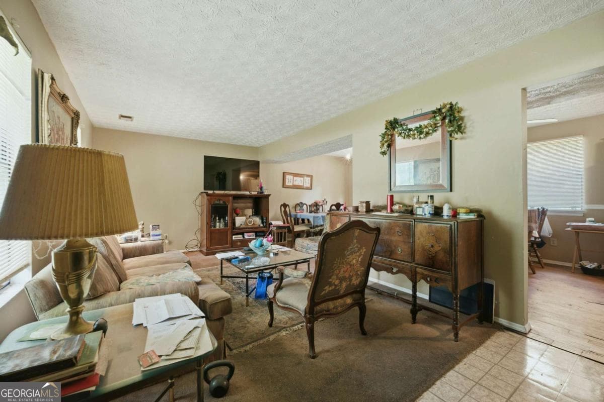3 bedroom, 2 bathroom, 1,196 sq ft single family residence for sale at 3957 Brookstone Court, Ellenwood, GA 30294 — photo 4