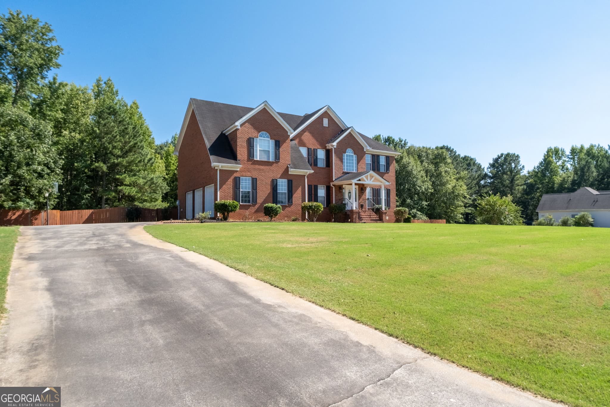 4 bedroom, 4.5 bathroom, 3,467 sq ft single family residence for sale at 125 Travis Trail, Fayetteville, GA 30215 — photo 3