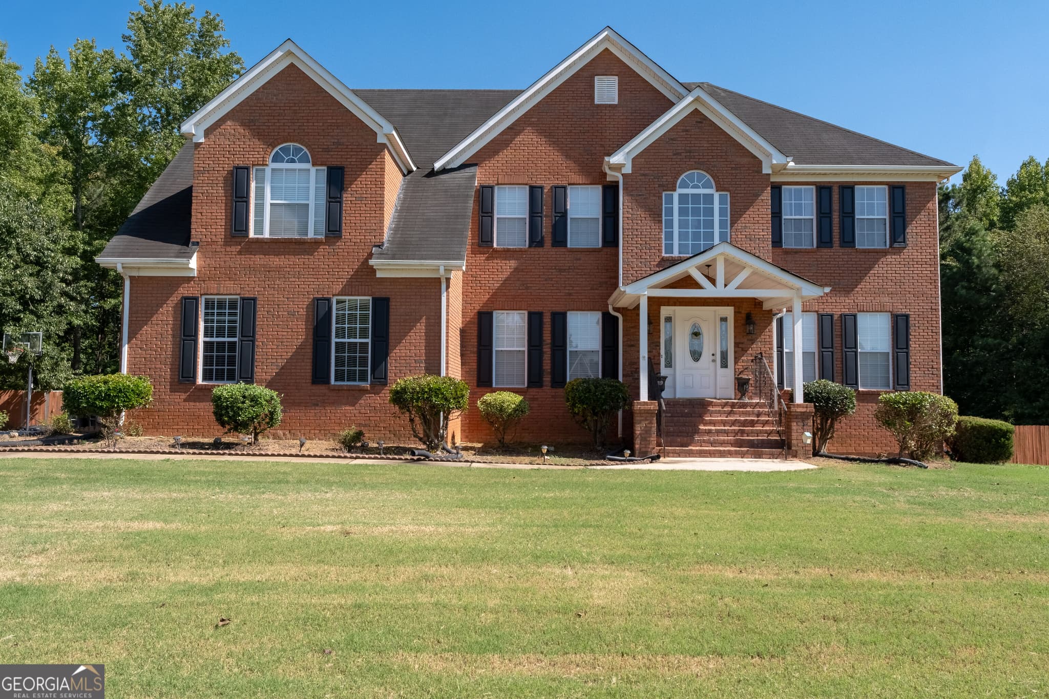 4 bedroom, 4.5 bathroom, 3,467 sq ft single family residence for sale at 125 Travis Trail, Fayetteville, GA 30215 — photo 1 of 49