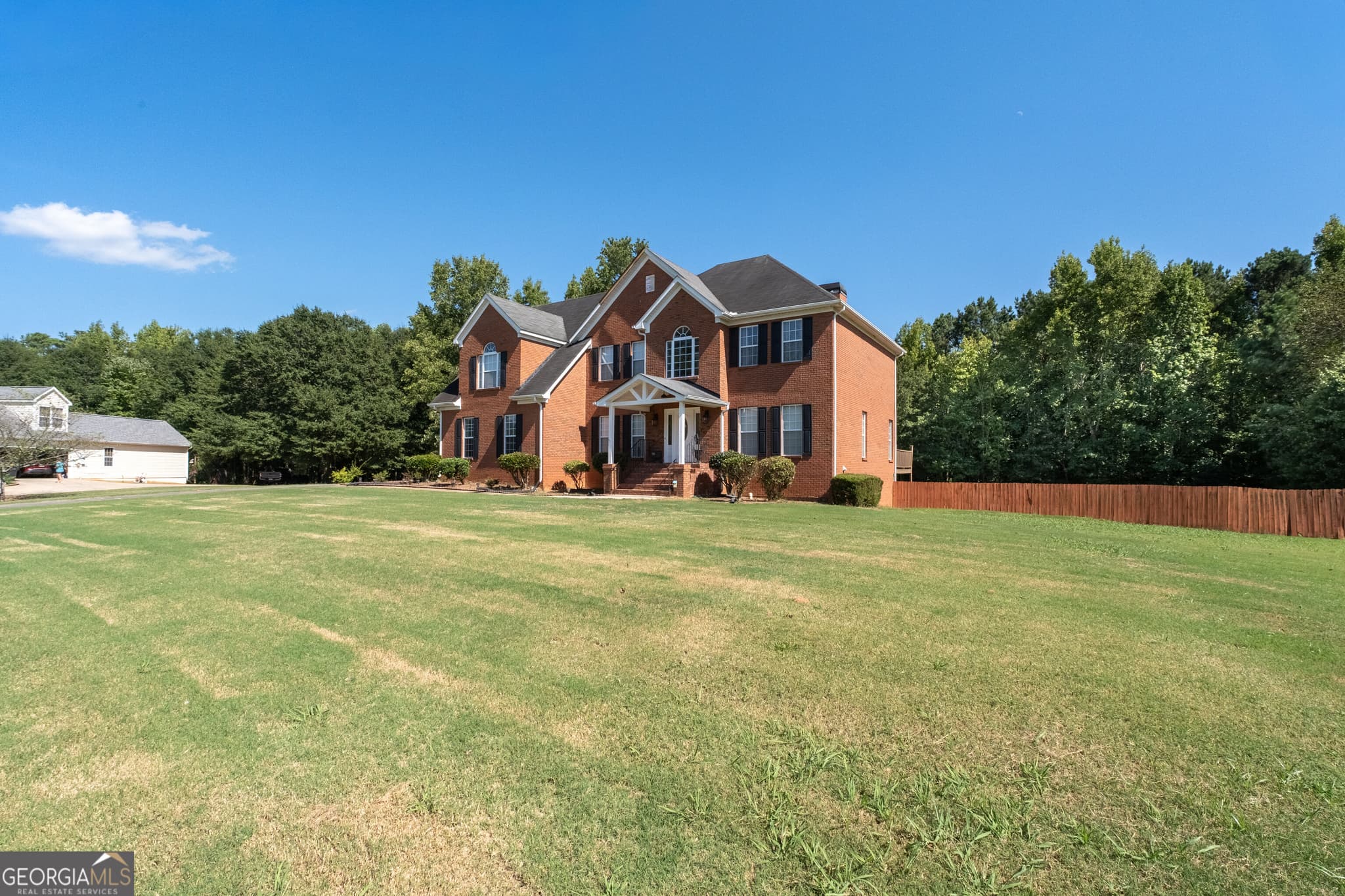 4 bedroom, 4.5 bathroom, 3,467 sq ft single family residence for sale at 125 Travis Trail, Fayetteville, GA 30215 — photo 4