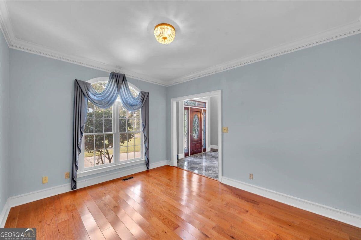 5 bedroom, 4.5 bathroom, 4,567 sq ft single family residence for sale at 98 Beverly Drive, Bonaire, GA 31005 — photo 6