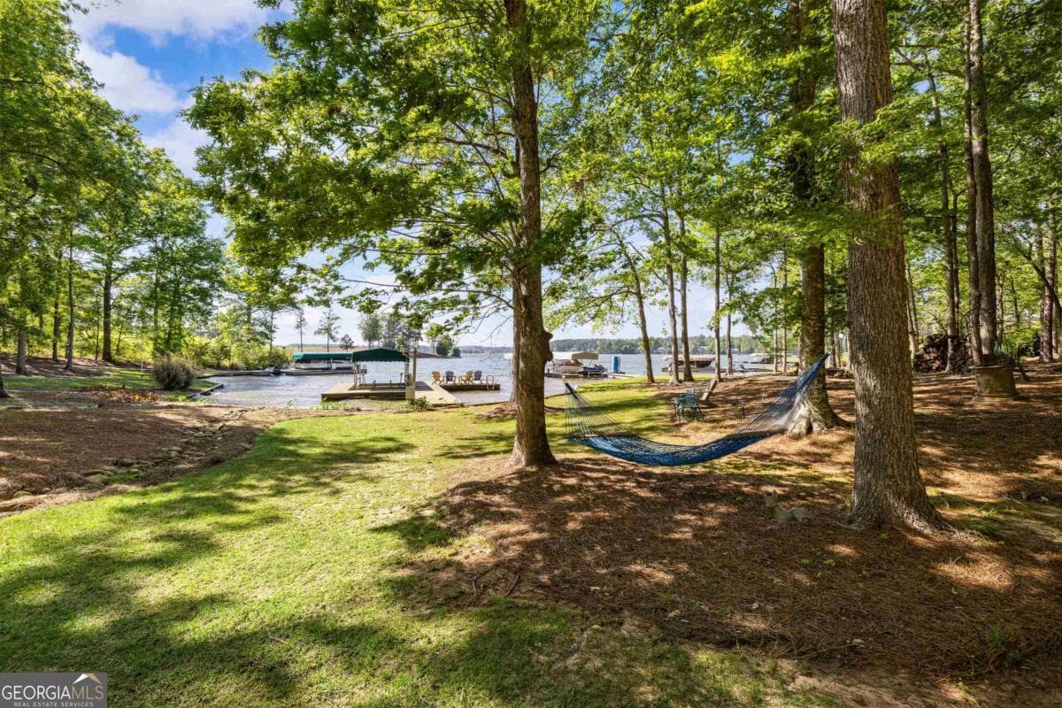 4 bedroom, 3.5 bathroom single family residence for sale at 129 Barrington Hall Drive, Eatonton, GA 31024 — photo 5