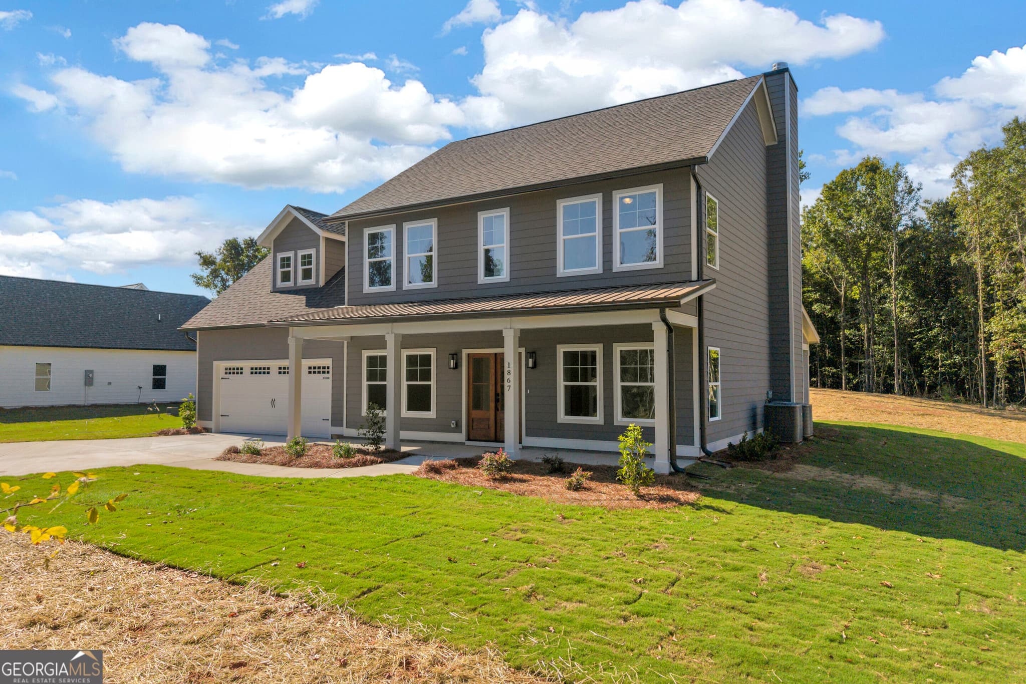 4 bedroom, 3.5 bathroom, 2,905 sq ft single family residence for sale at 1867 Hoods Mill Road, Commerce, GA 30529 — photo 7
