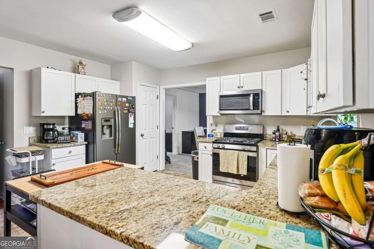 4 bedroom, 2.5 bathroom, 2,585 sq ft single family residence for sale at 206 Five Iron Court, Kennesaw, GA 30144 — photo 10