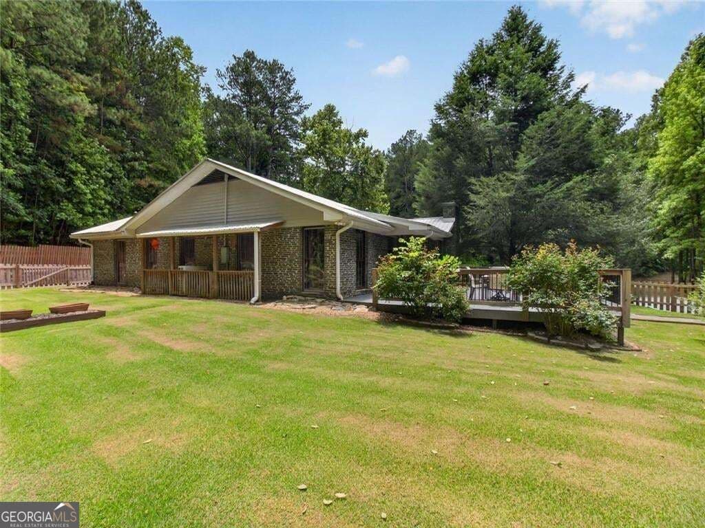 7 bedroom, 5.5 bathroom, 6,910 sq ft single family residence for sale at 105 Whitestone Road North, Talking Rock, GA 30175 — photo 2