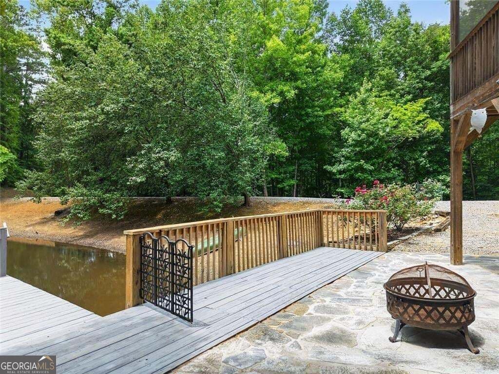 7 bedroom, 5.5 bathroom, 6,910 sq ft single family residence for sale at 105 Whitestone Road North, Talking Rock, GA 30175 — photo 7
