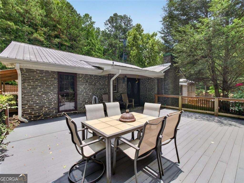 7 bedroom, 5.5 bathroom, 6,910 sq ft single family residence for sale at 105 Whitestone Road North, Talking Rock, GA 30175 — photo 3