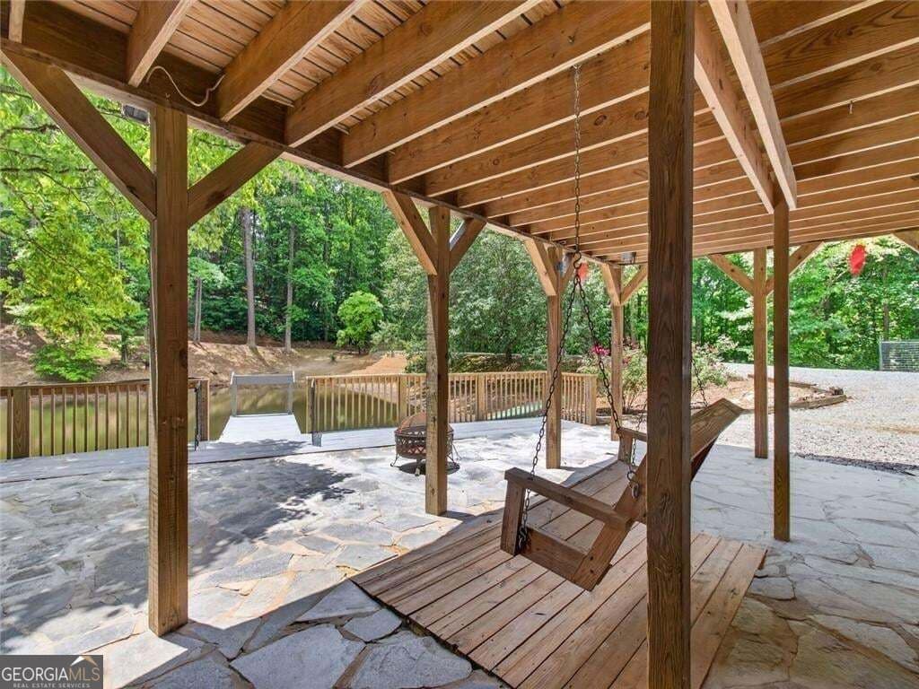 7 bedroom, 5.5 bathroom, 6,910 sq ft single family residence for sale at 105 Whitestone Road North, Talking Rock, GA 30175 — photo 10