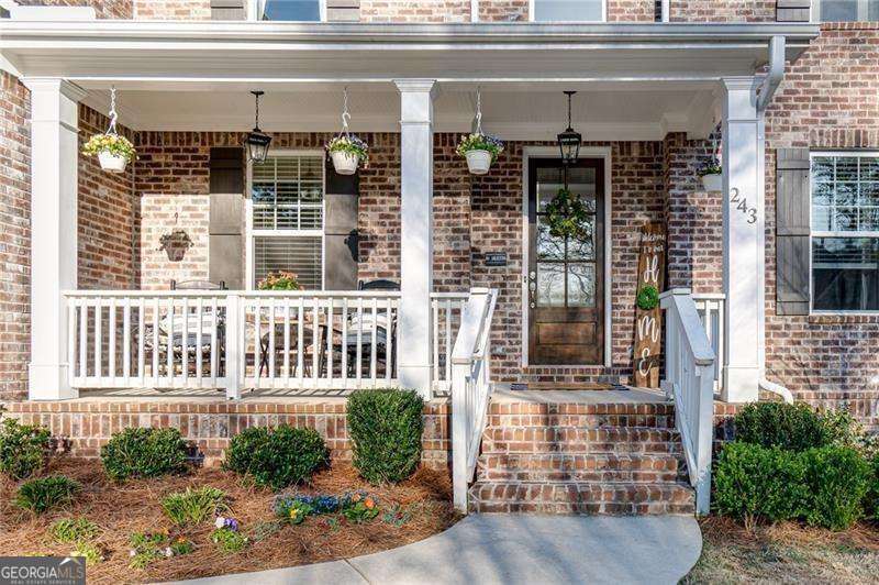 5 bedroom, 4.5 bathroom, 9,400 sq ft single family residence for sale at 243 Harmony Lake Drive, Canton, GA 30115 — photo 2