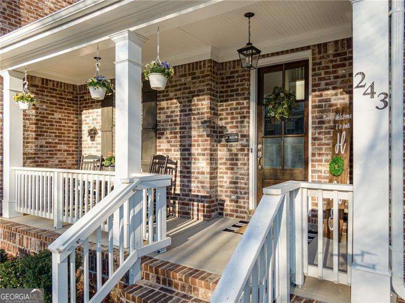5 bedroom, 4.5 bathroom, 9,400 sq ft single family residence for sale at 243 Harmony Lake Drive, Canton, GA 30115 — photo 3