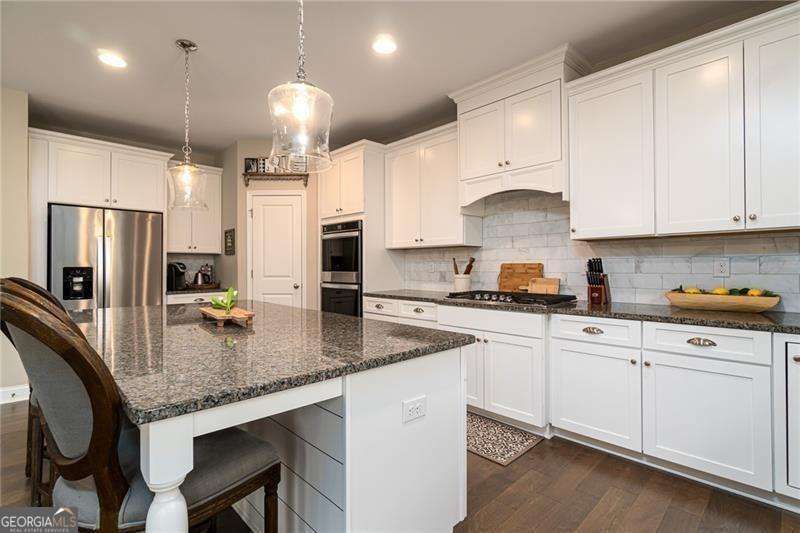 5 bedroom, 4.5 bathroom, 9,400 sq ft single family residence for sale at 243 Harmony Lake Drive, Canton, GA 30115 — photo 5