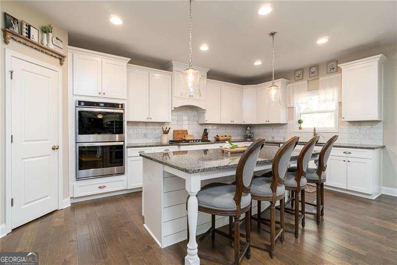 5 bedroom, 4.5 bathroom, 9,400 sq ft single family residence for sale at 243 Harmony Lake Drive, Canton, GA 30115 — photo 4