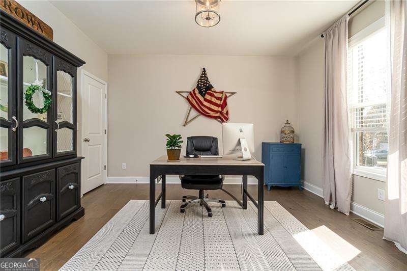 5 bedroom, 4.5 bathroom, 9,400 sq ft single family residence for sale at 243 Harmony Lake Drive, Canton, GA 30115 — photo 8