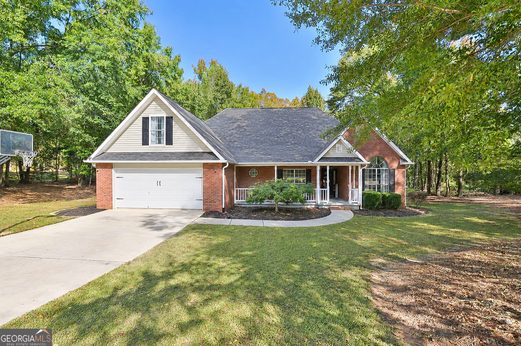 4 bedroom, 2 bathroom, 2,195 sq ft single family residence for sale at 100 T J Harris Drive, Jenkinsburg, GA 30234 — photo 2