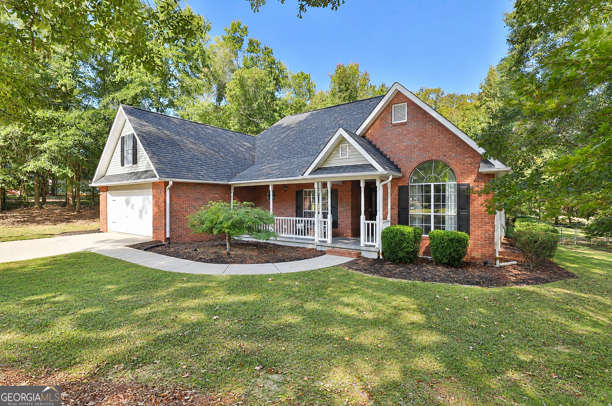 4 bedroom, 2 bathroom, 2,195 sq ft single family residence for sale at 100 T J Harris Drive, Jenkinsburg, GA 30234 — photo 3