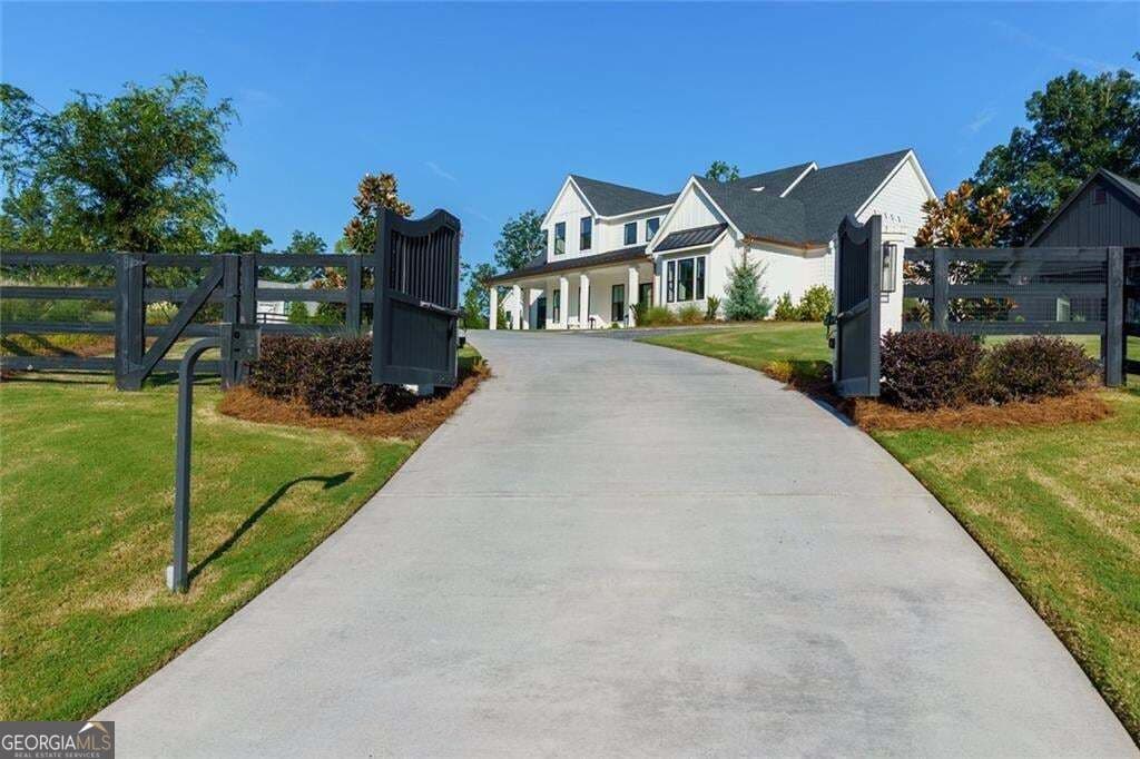 5 bedroom, 6 bathroom, 4,633 sq ft single family residence for sale at 2129 Sugar Pike Road, Woodstock, GA 30188 — photo 2