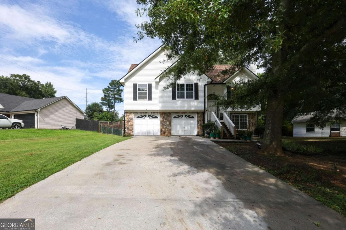 3 bedroom, 3 bathroom, 1,932 sq ft single family residence for sale at 75 Woodland Ridge Circle, Covington, GA 30016 — photo 2