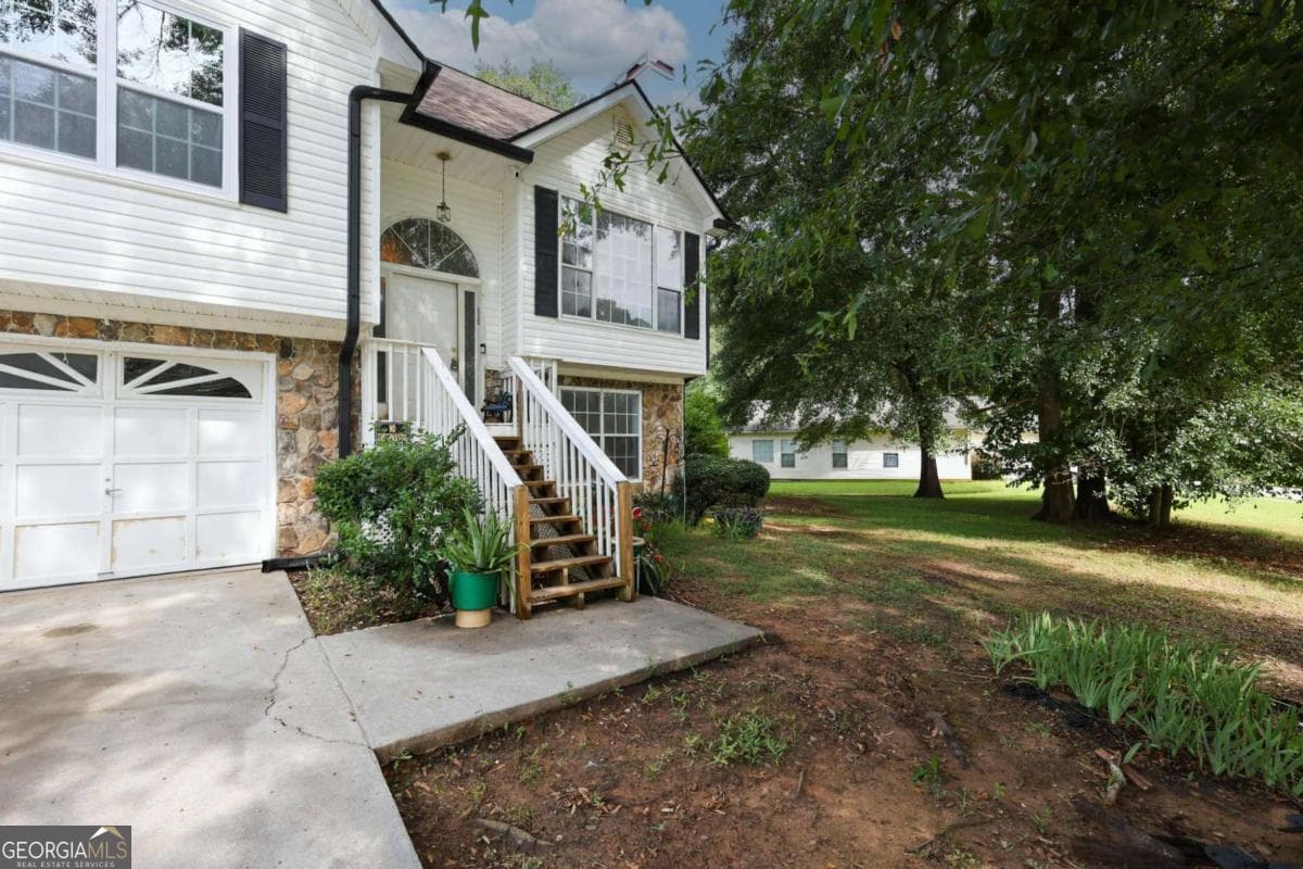 3 bedroom, 3 bathroom, 1,932 sq ft single family residence for sale at 75 Woodland Ridge Circle, Covington, GA 30016 — photo 1 of 19
