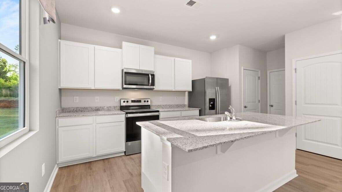 4 bedroom, 2.5 bathroom, 2,176 sq ft single family residence for sale at 439 Creekview Way, Dallas, GA 30132 — photo 6
