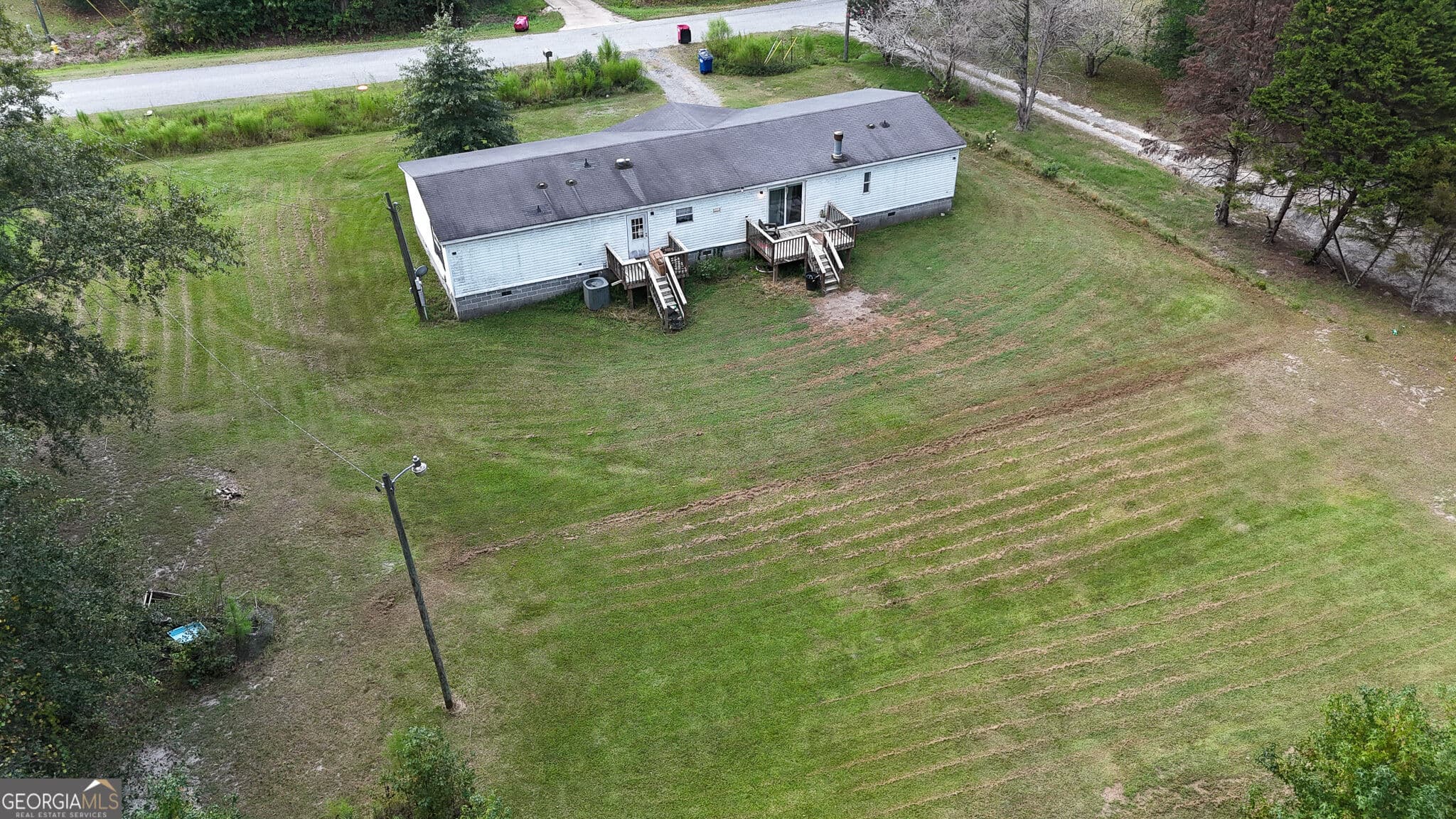 4 bedroom, 2 bathroom, 2,240 sq ft manufactured home,single family residence for sale at 205 BRIAR CREEK Way, Lizella, GA 31052 — photo 7