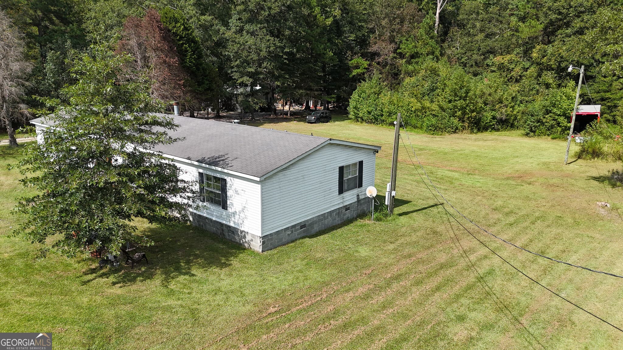 4 bedroom, 2 bathroom, 2,240 sq ft manufactured home,single family residence for sale at 205 BRIAR CREEK Way, Lizella, GA 31052 — photo 8