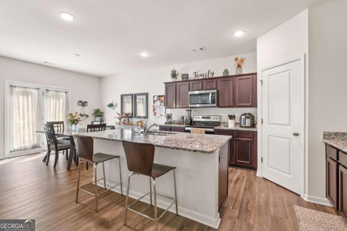 4 bedroom, 2.5 bathroom, 2,479 sq ft single family residence for sale at 155 Cherohala Court, Covington, GA 30016 — photo 6