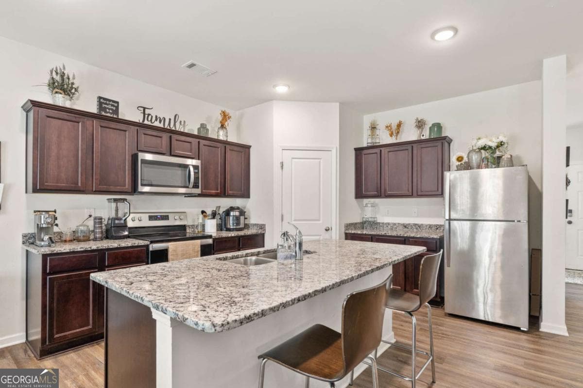 4 bedroom, 2.5 bathroom, 2,479 sq ft single family residence for sale at 155 Cherohala Court, Covington, GA 30016 — photo 7