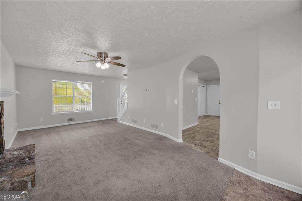 4 bedroom, 2.5 bathroom, 2,298 sq ft single family residence for sale at 1450 Timber Walk Drive, Loganville, GA 30052 — photo 3