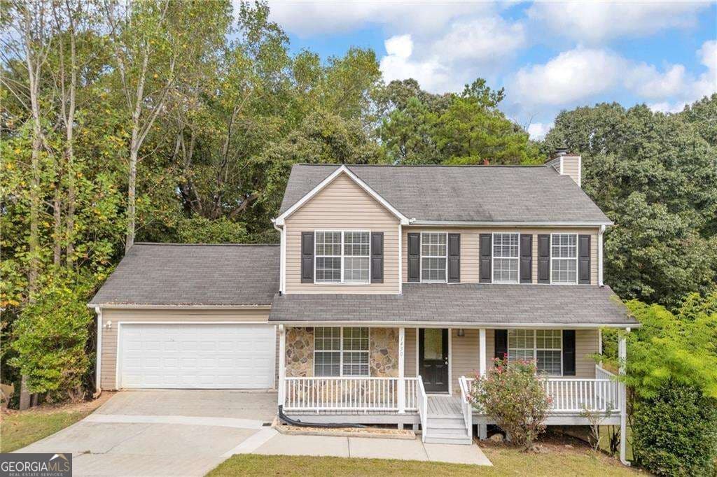 4 bedroom, 2.5 bathroom, 2,298 sq ft single family residence for sale at 1450 Timber Walk Drive, Loganville, GA 30052 — photo 1 of 34