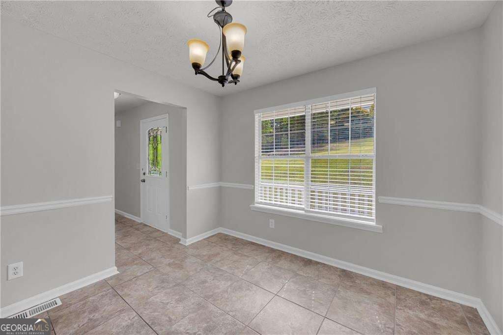 4 bedroom, 2.5 bathroom, 2,298 sq ft single family residence for sale at 1450 Timber Walk Drive, Loganville, GA 30052 — photo 9