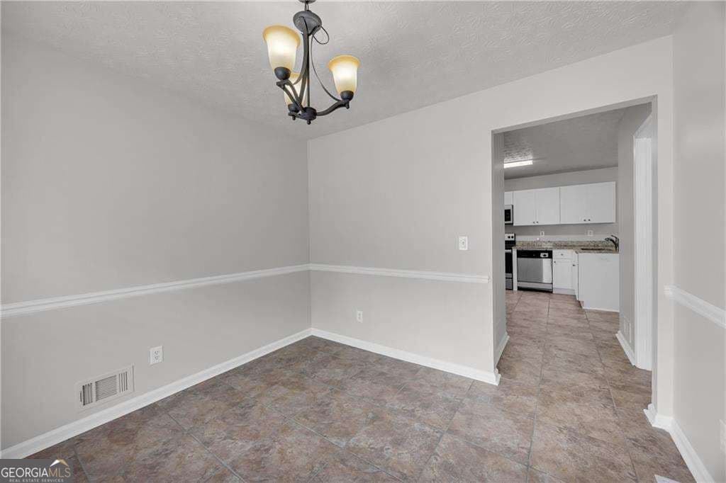 4 bedroom, 2.5 bathroom, 2,298 sq ft single family residence for sale at 1450 Timber Walk Drive, Loganville, GA 30052 — photo 10