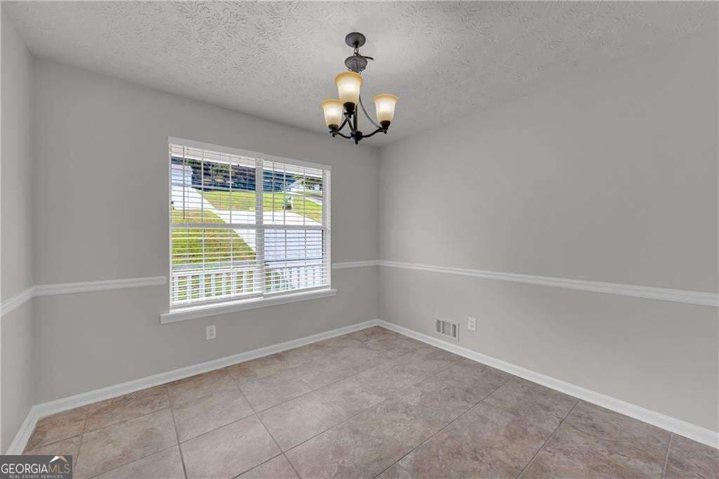 4 bedroom, 2.5 bathroom, 2,298 sq ft single family residence for sale at 1450 Timber Walk Drive, Loganville, GA 30052 — photo 8