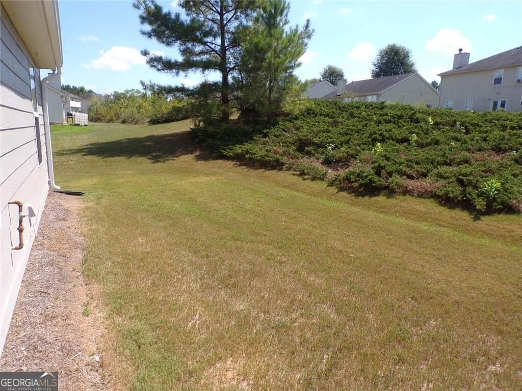 4 bedroom, 2 bathroom, 1,728 sq ft single family residence for rent at 7540 Old Chapel, Atlanta, GA 30349 for $2,050 a month — photo 6