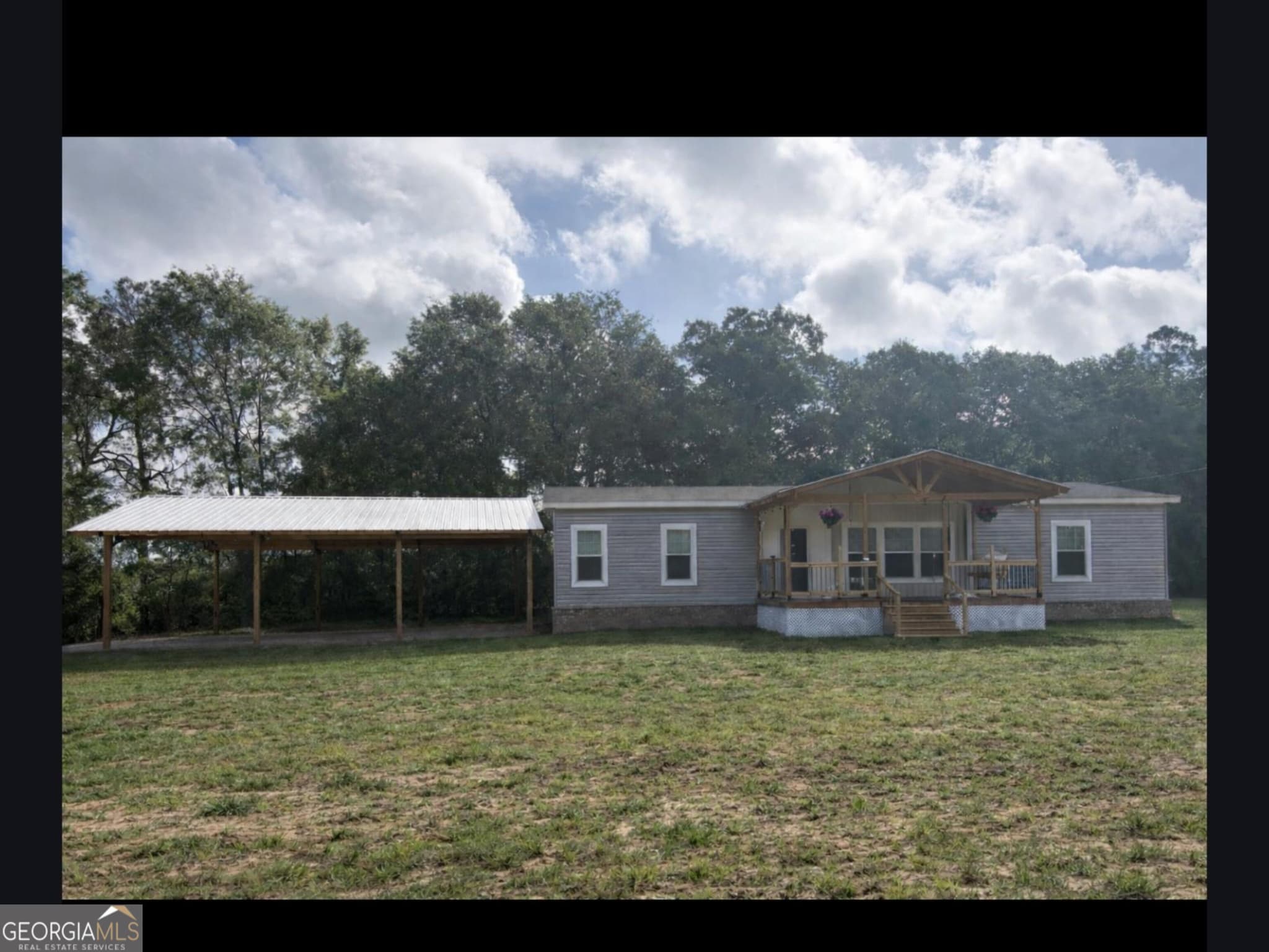 3 bedroom, 2 bathroom, 1,920 sq ft single family residence for sale at 4983 Ga Highway 121, Millen, GA 30442 — photo 2