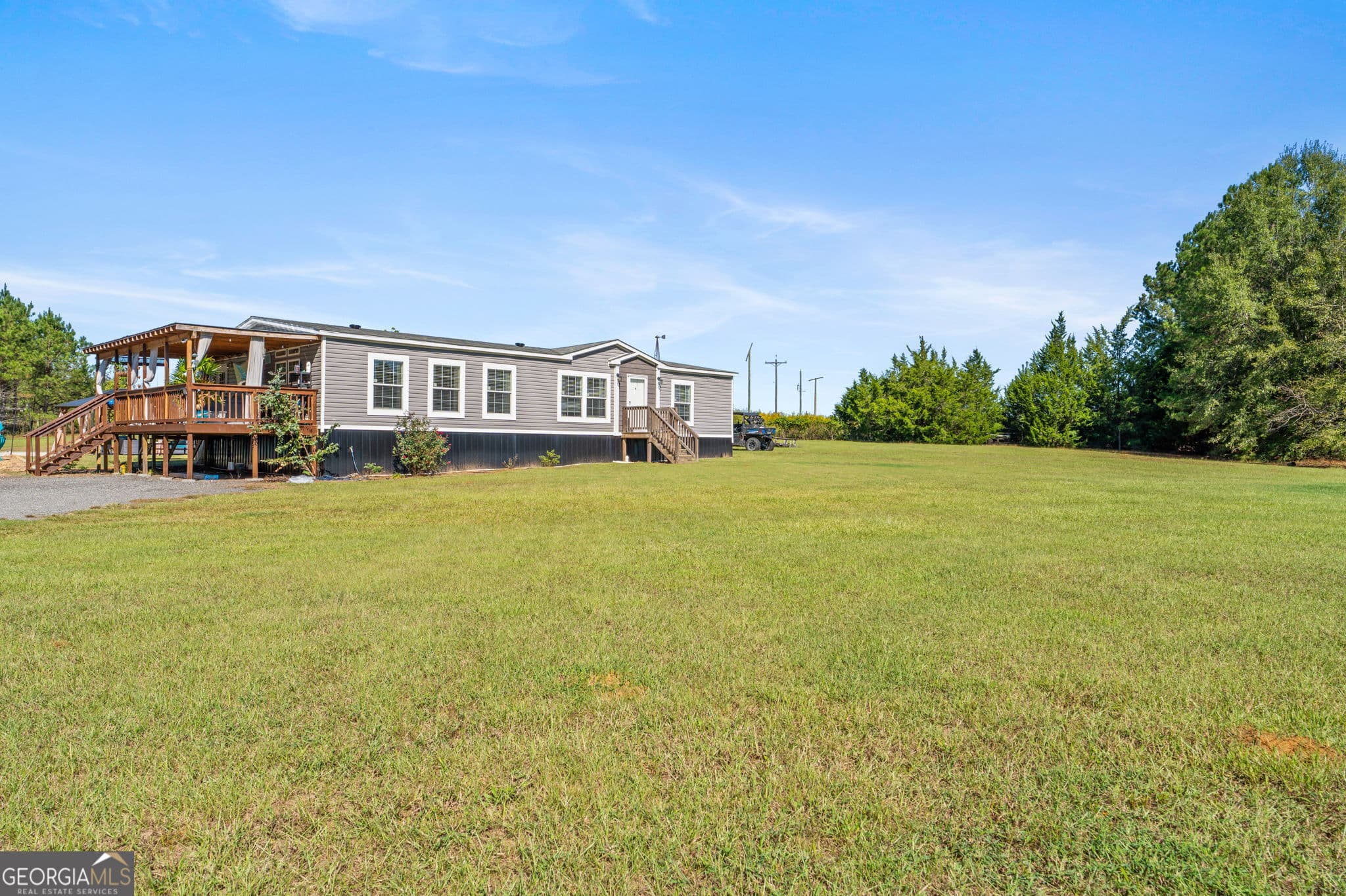 3 bedroom, 2 bathroom, 1,856 sq ft manufactured home,single family residence for sale at 916 E Flournoy Road, Hawkinsville, GA 31036 — photo 6