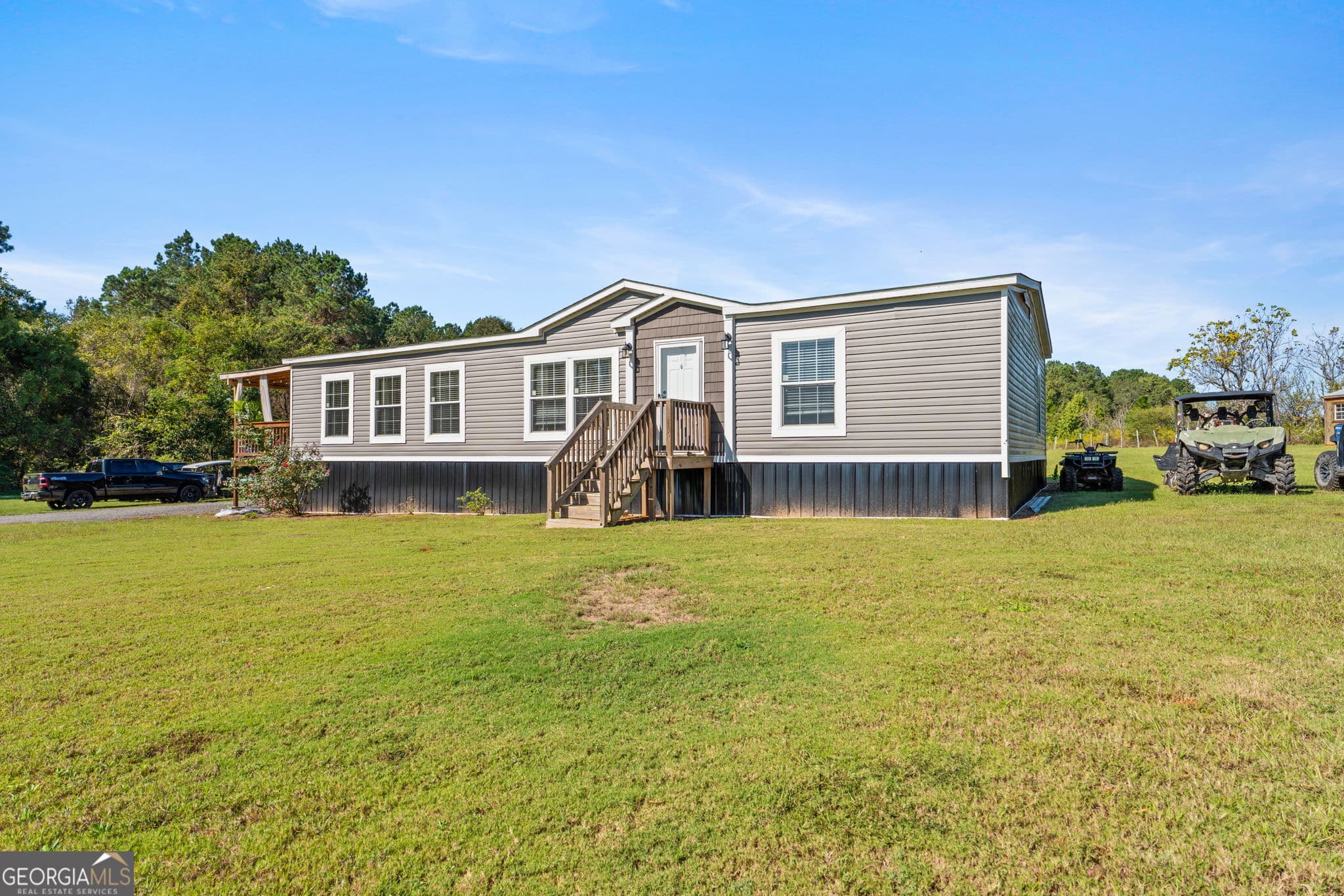 3 bedroom, 2 bathroom, 1,856 sq ft manufactured home,single family residence for sale at 916 E Flournoy Road, Hawkinsville, GA 31036 — photo 1 of 64