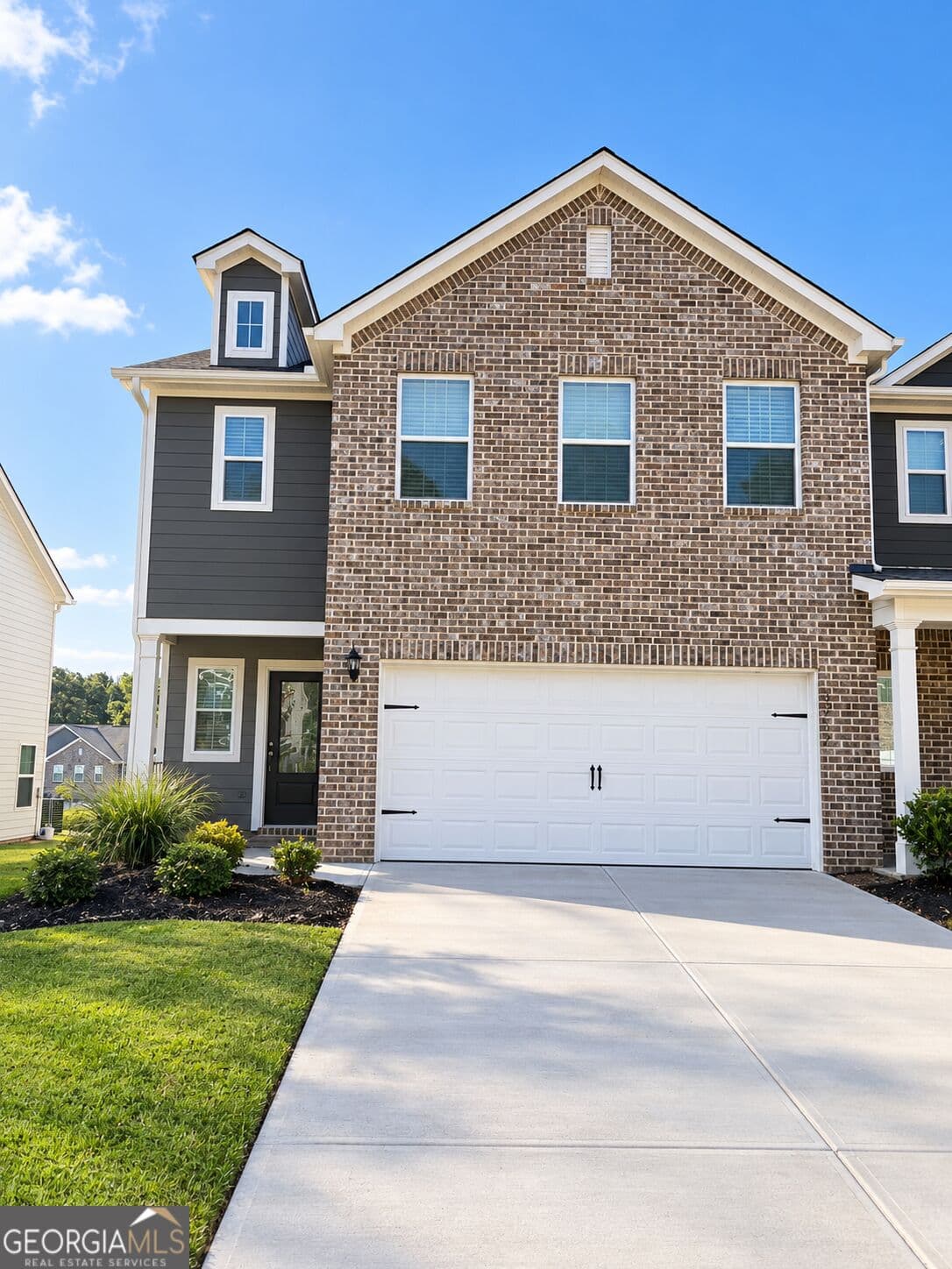 4 bedroom, 2.5 bathroom, 2,252 sq ft townhouse for sale at 3952 Hidden River Lane, Oakwood, GA 30566 — photo 1 of 34