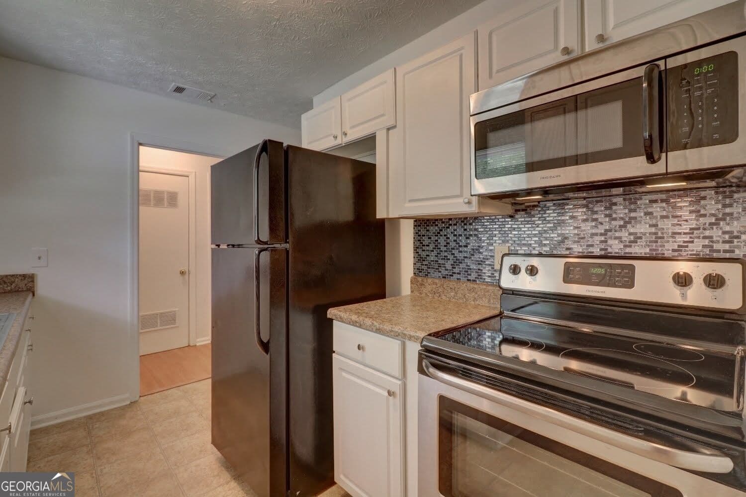 3 bedroom, 2 bathroom, 1,456 sq ft single family residence for sale at 4749 Lost Colony Court, Stone Mountain, GA 30088 — photo 6