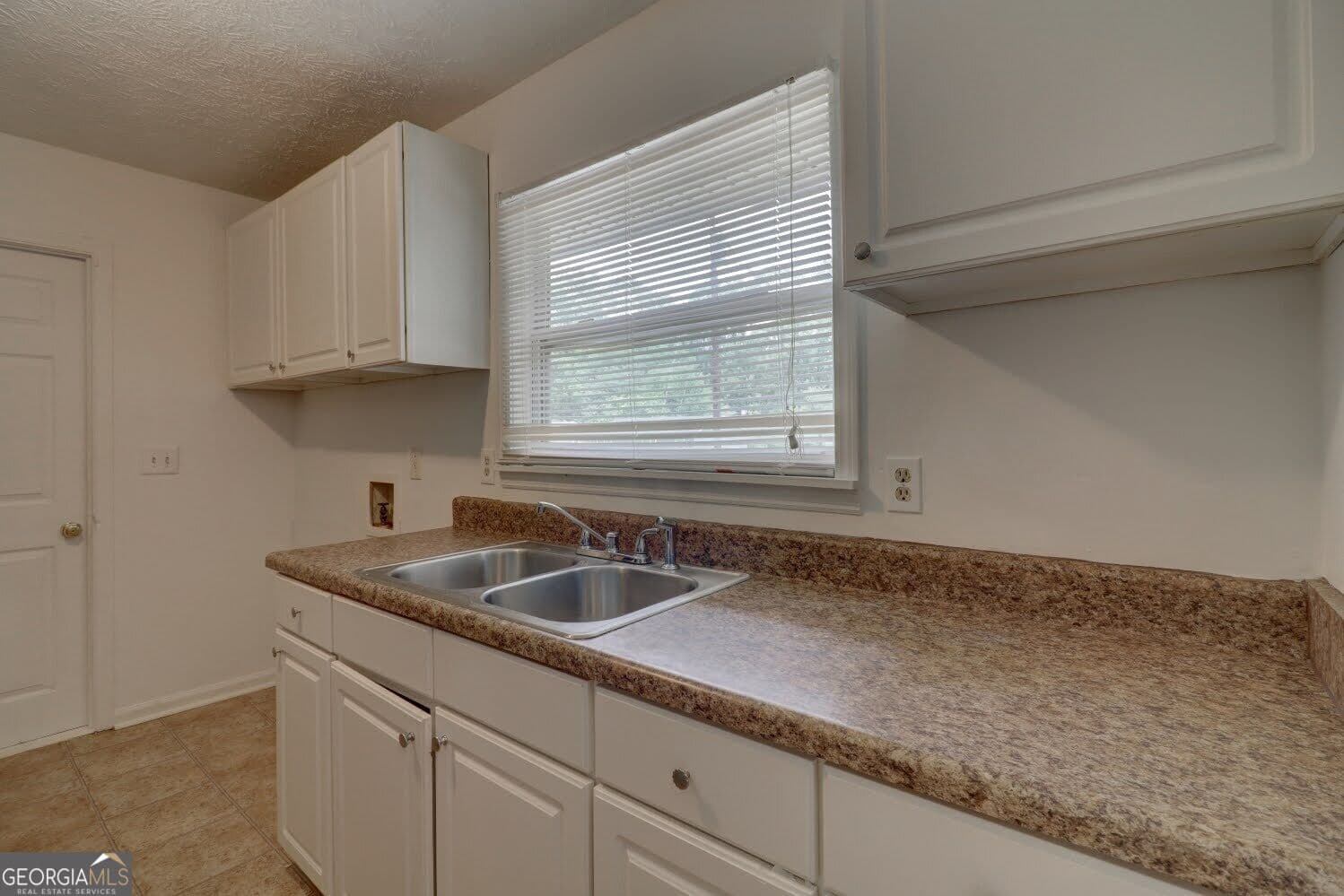 3 bedroom, 2 bathroom, 1,456 sq ft single family residence for sale at 4749 Lost Colony Court, Stone Mountain, GA 30088 — photo 5