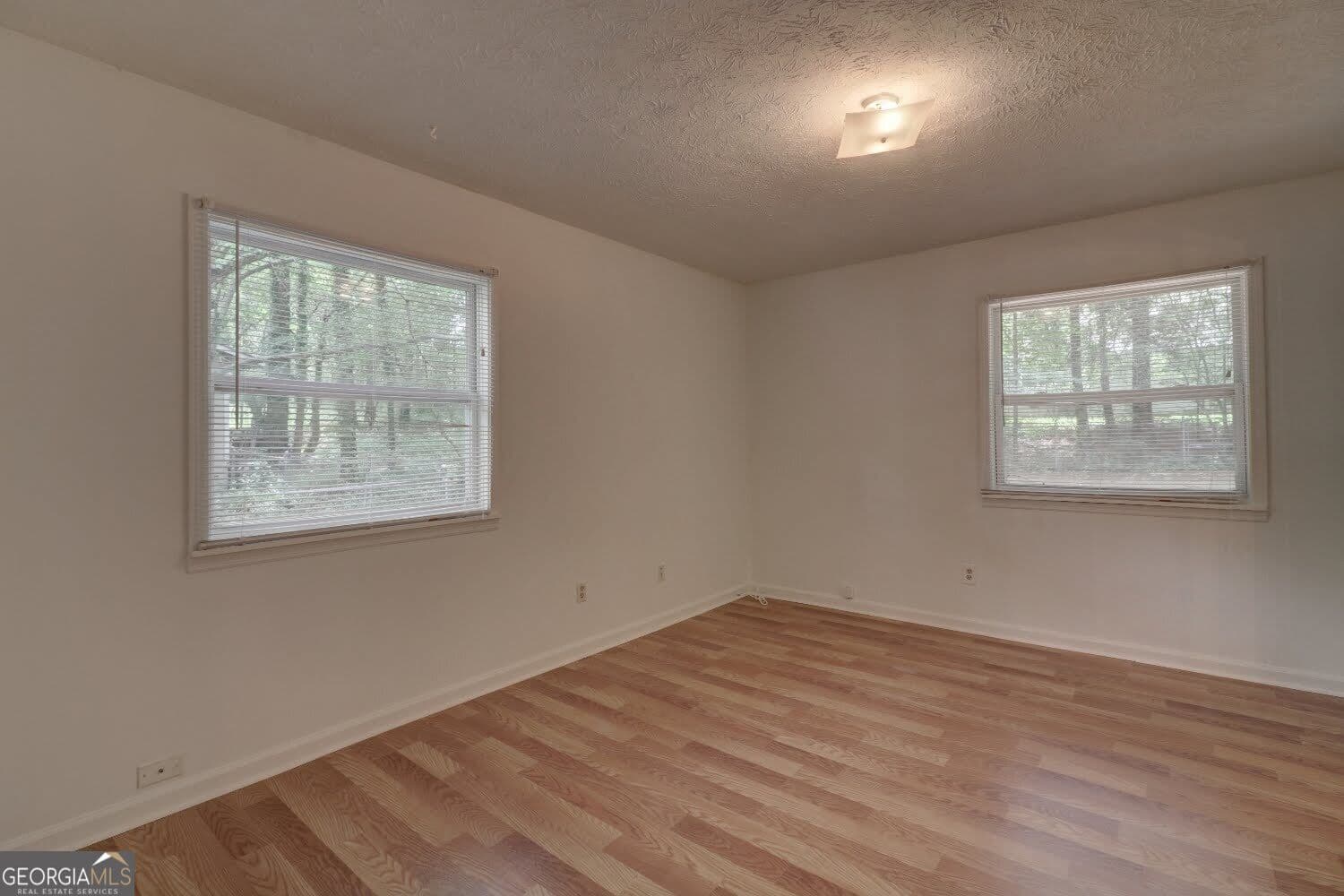3 bedroom, 2 bathroom, 1,456 sq ft single family residence for sale at 4749 Lost Colony Court, Stone Mountain, GA 30088 — photo 9