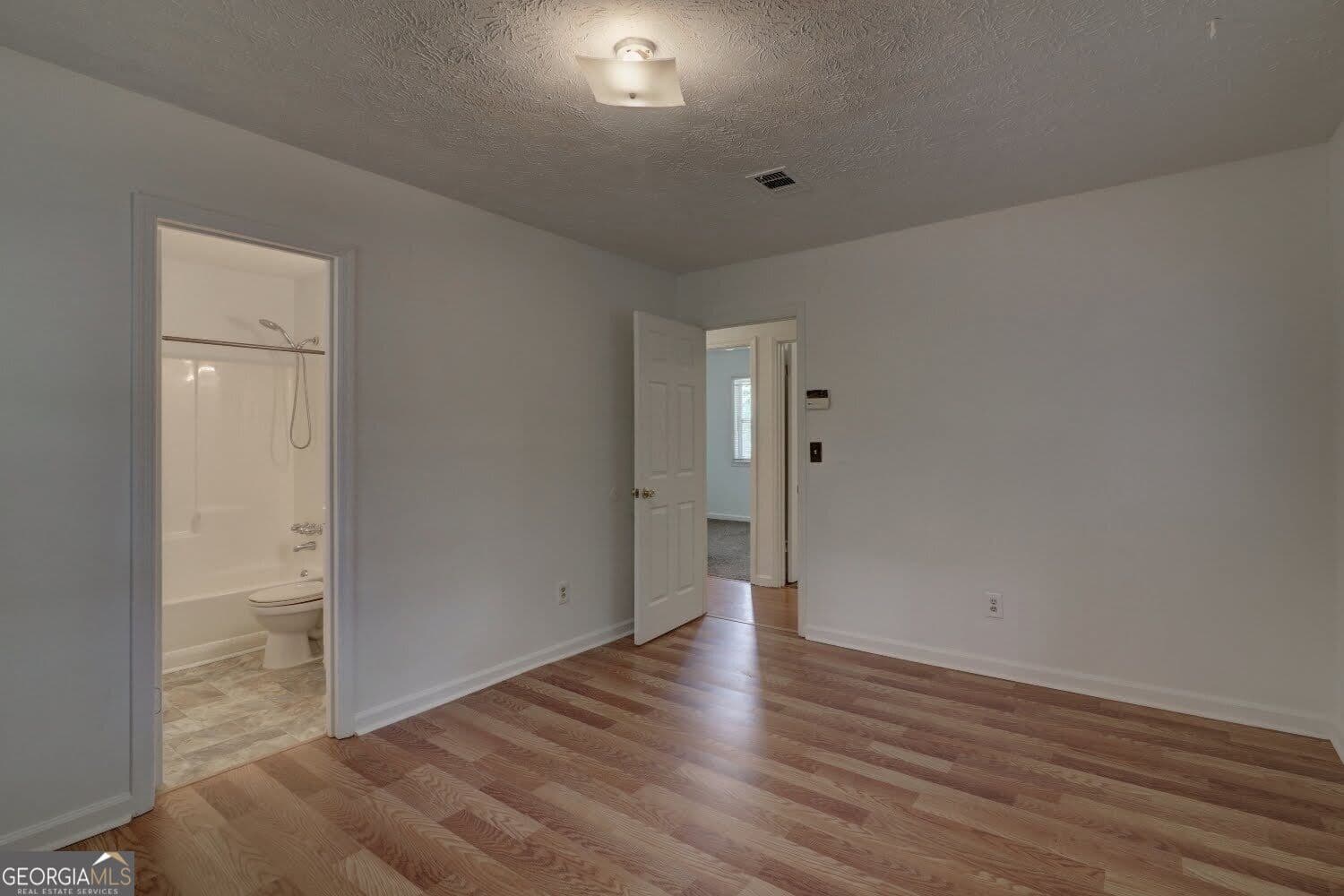 3 bedroom, 2 bathroom, 1,456 sq ft single family residence for sale at 4749 Lost Colony Court, Stone Mountain, GA 30088 — photo 10