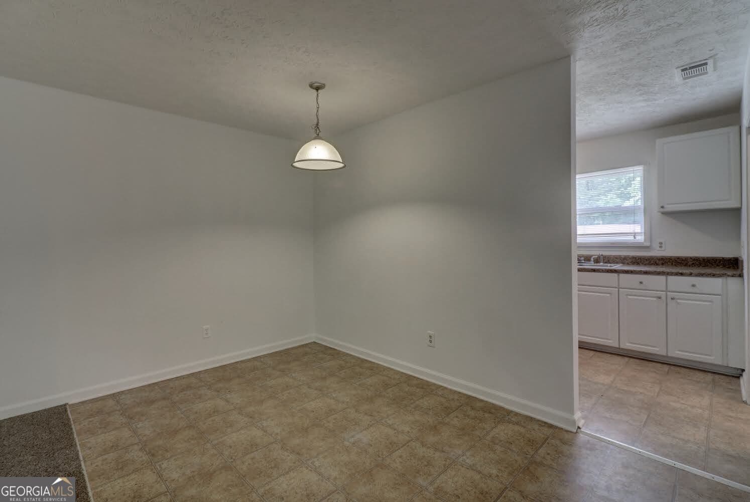 3 bedroom, 2 bathroom, 1,456 sq ft single family residence for sale at 4749 Lost Colony Court, Stone Mountain, GA 30088 — photo 8