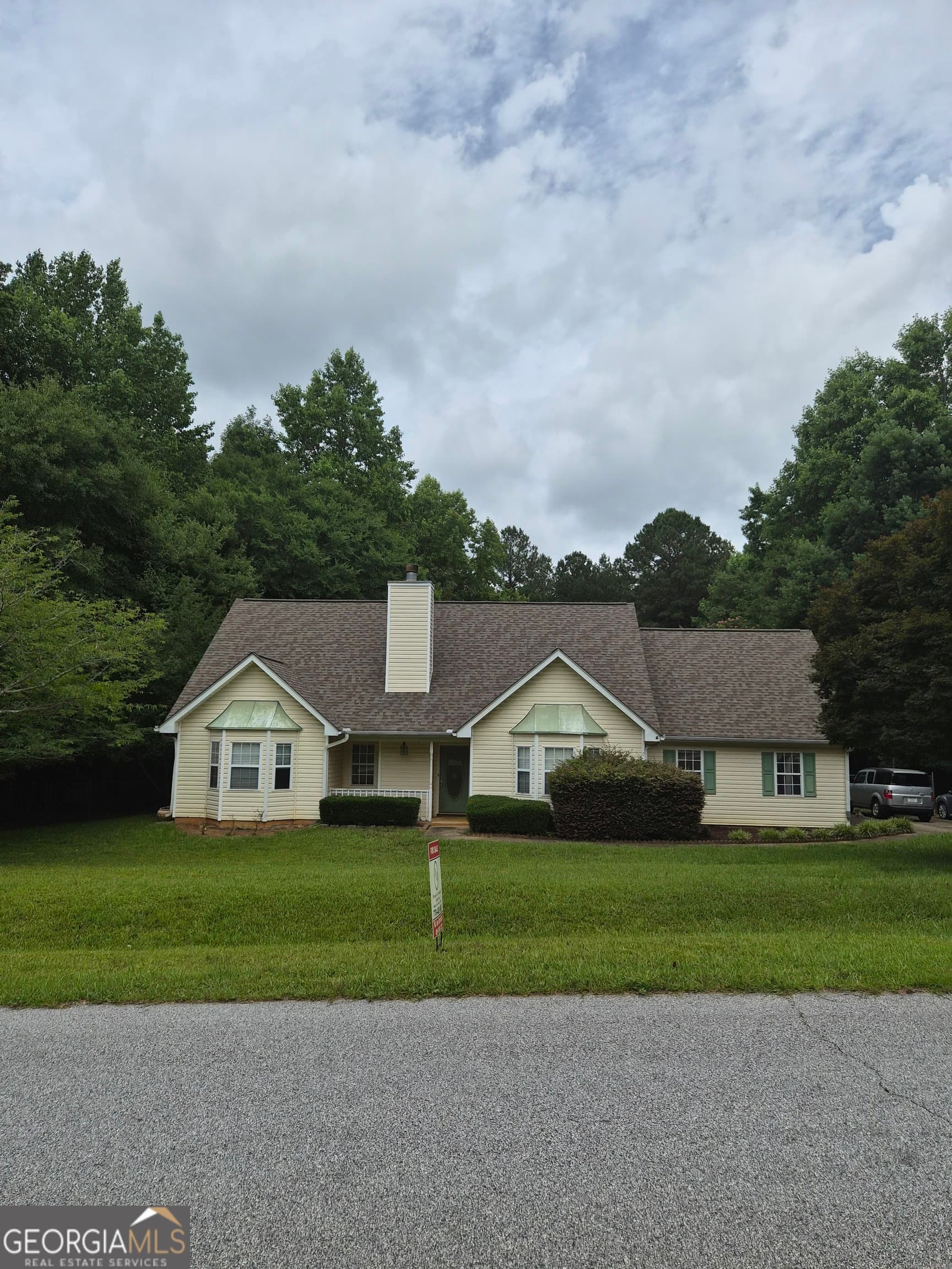 4 bedroom, 2 bathroom, 1,975 sq ft single family residence sold at 200 Five Oaks Drive, Covington, GA 30014