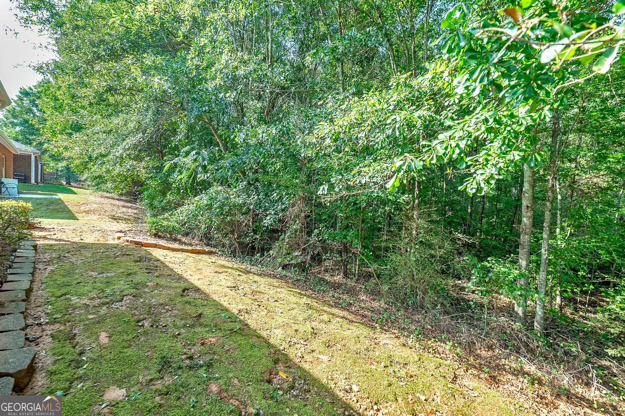 4 bedroom, 3 bathroom, 1,775 sq ft single family residence for sale at 140 Astilbe Meadow Drive, Locust Grove, GA 30248 — photo 5