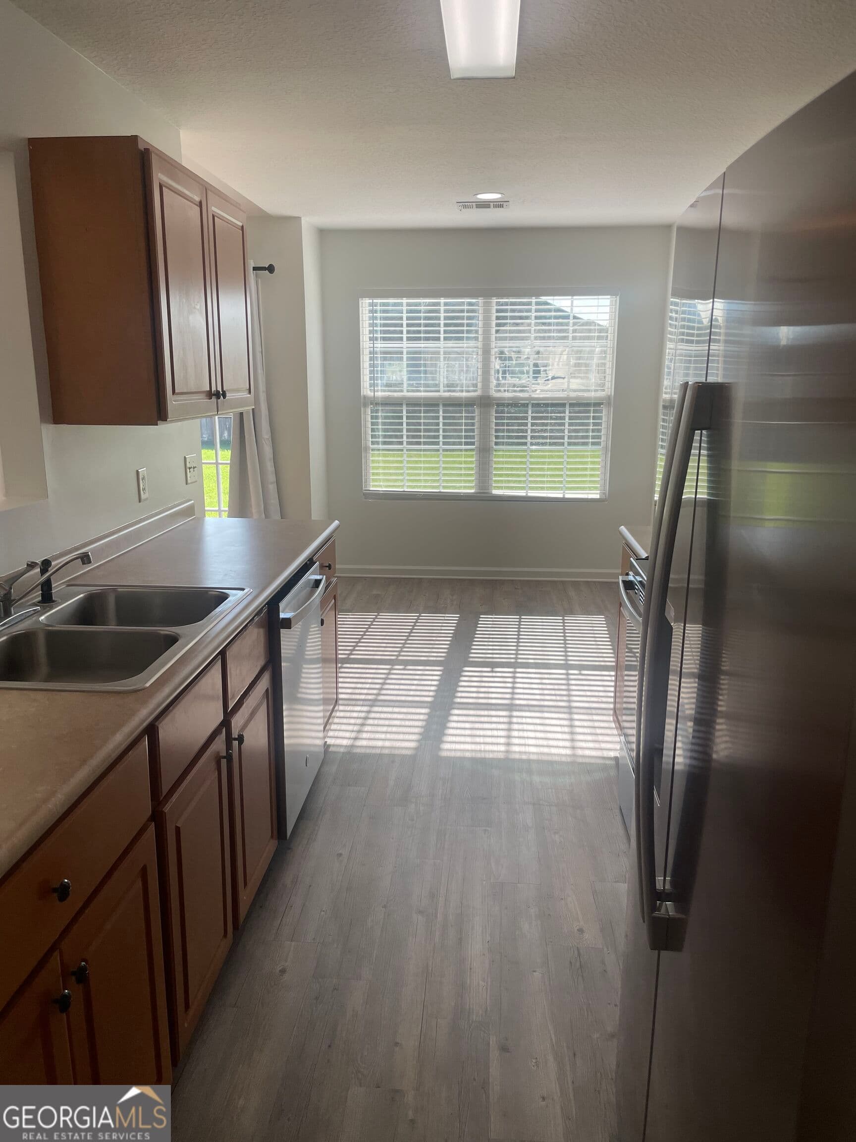 3 bedroom, 2 bathroom, 1,261 sq ft single family residence for sale at 9054 Whispering Pines Boulevard, Statesboro, GA 30458 — photo 5
