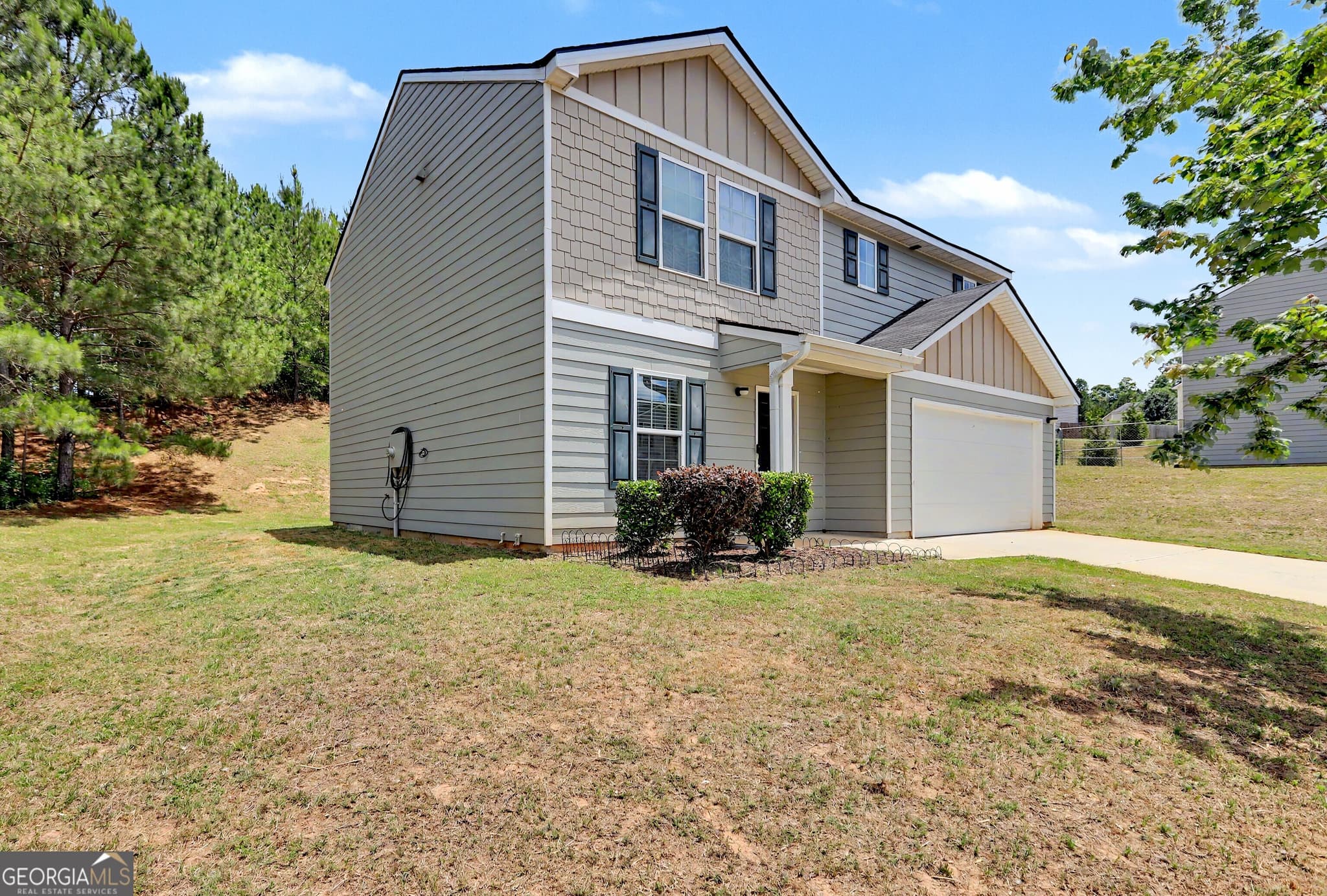 4 bedroom, 3 bathroom, 1,876 sq ft single family residence for sale at 1777 Robinson Court, Griffin, GA 30224 — photo 2