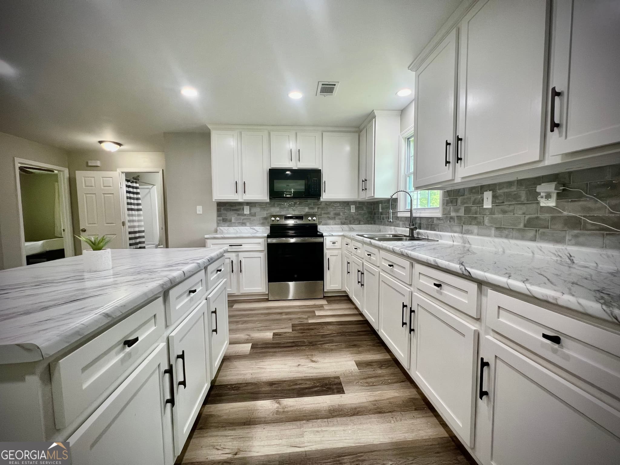 3 bedroom, 2 bathroom, 1,438 sq ft single family residence for sale at 1962 Anderson Road, Rentz, GA 31075 — photo 7