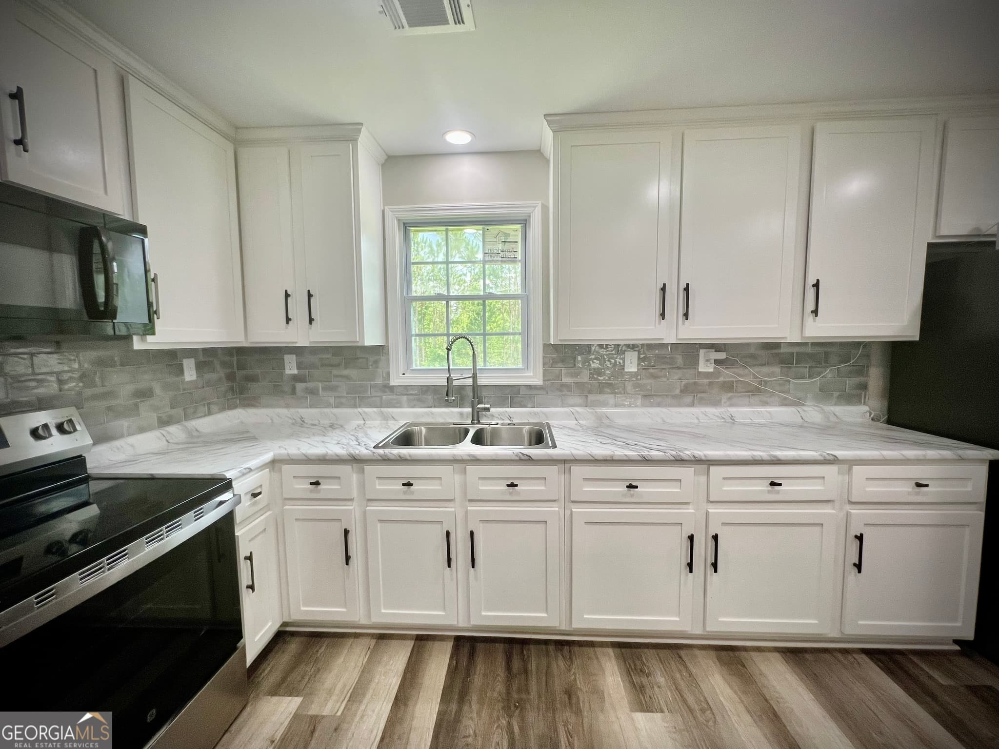 3 bedroom, 2 bathroom, 1,438 sq ft single family residence for sale at 1962 Anderson Road, Rentz, GA 31075 — photo 8