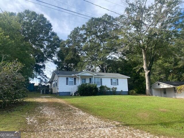 3 bedroom, 1 bathroom, 1,056 sq ft single family residence for sale at 3032 36th Avenue, Lanett, AL 36863 — photo 6
